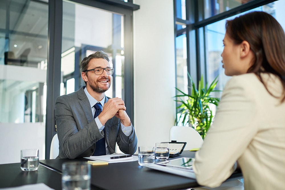 advisor meets with client