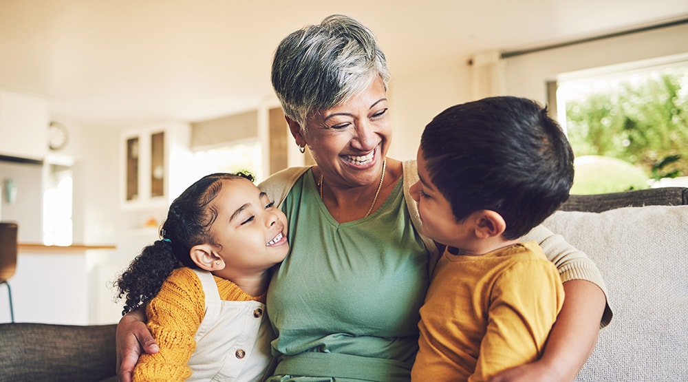 Woman hugs children