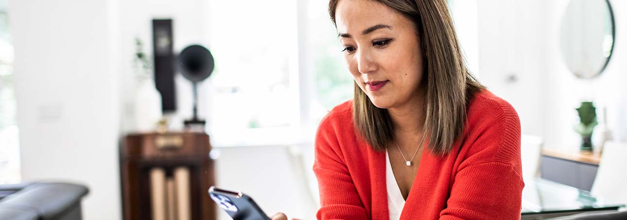 Woman applying on smart phone